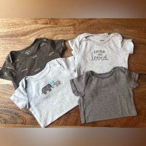 Set of 4 Carter’s onesies! Excellent condition!